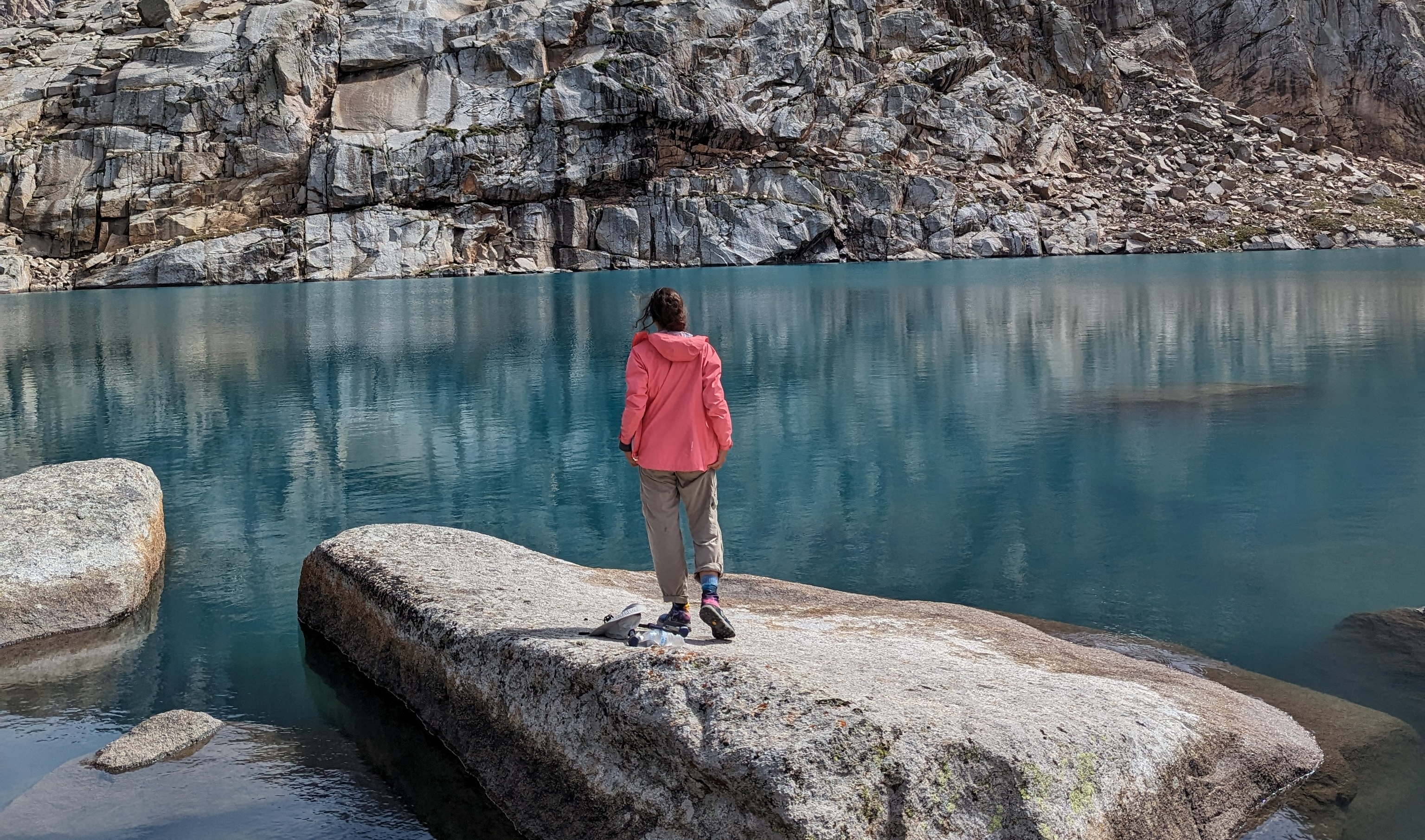 women backpacker in an high lake